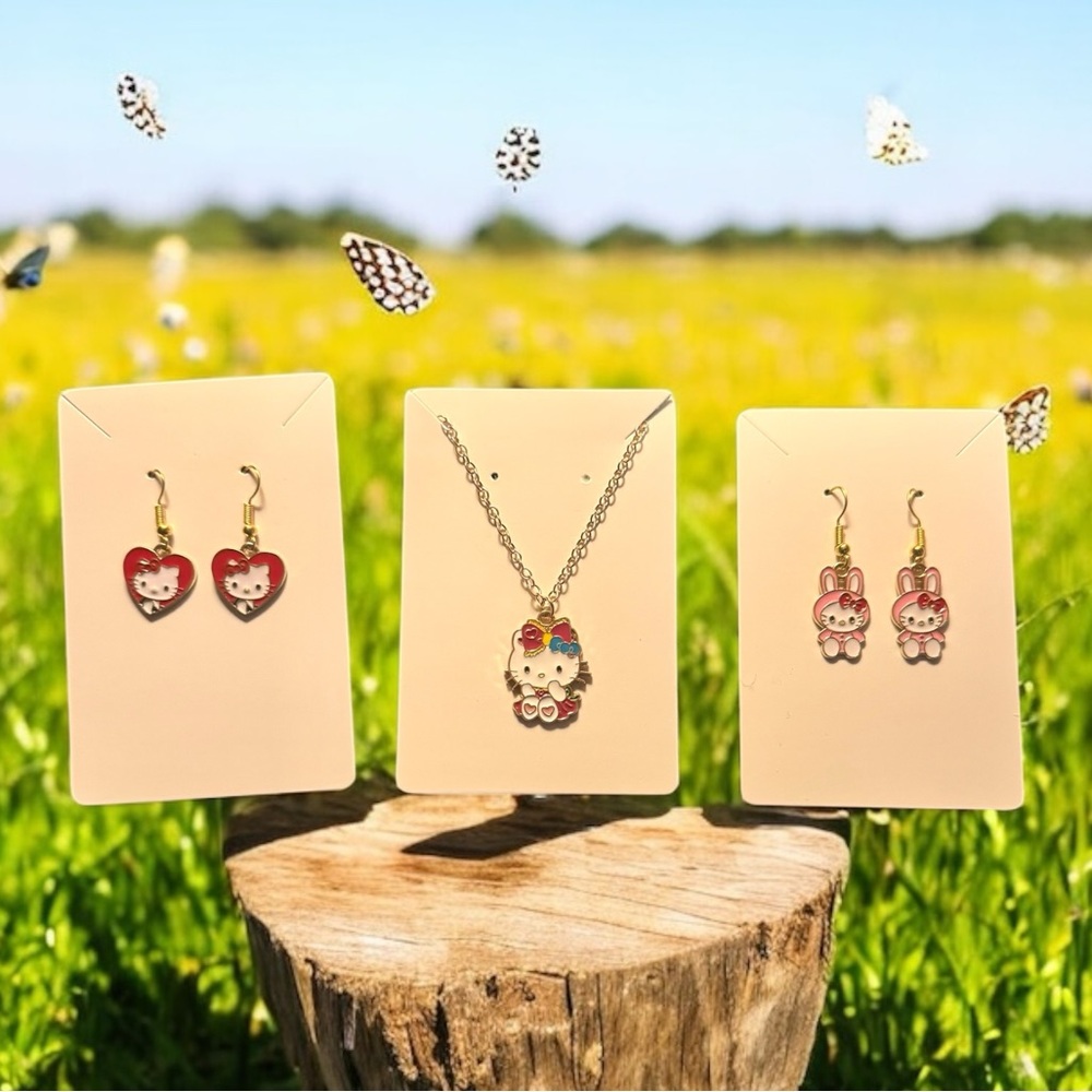 Hello Kitty 3 piece set .. two set of earrings & necklace (new)